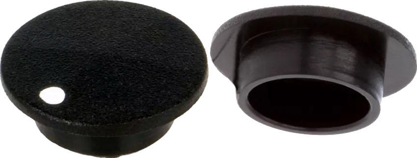 black cap with white marker dot